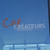 "Cap Créateurs" écrit sur une grande vitre, vue de l'intérieur.